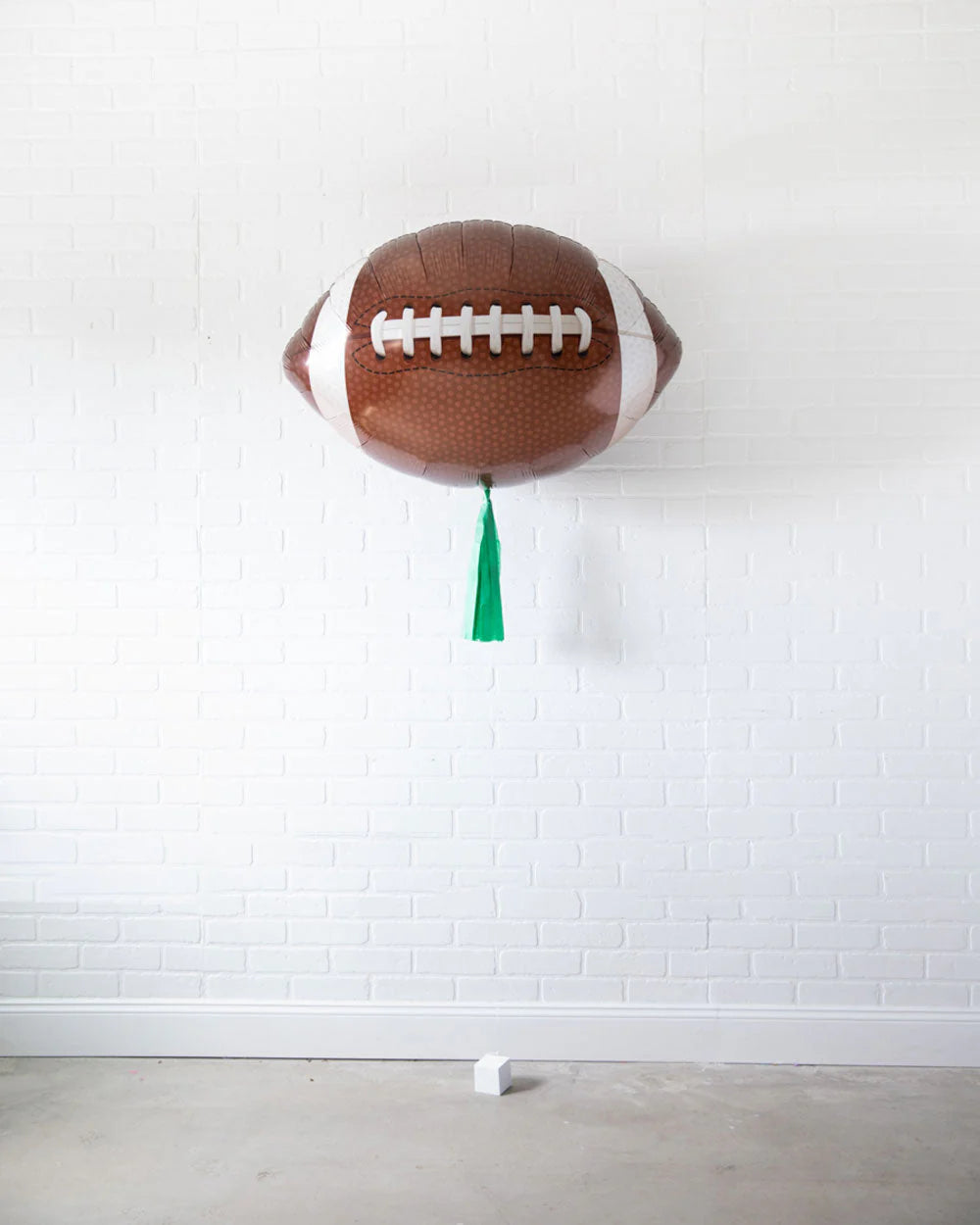 Jumbo Football Helium Balloon with Tassel – Game Day Statement Piece